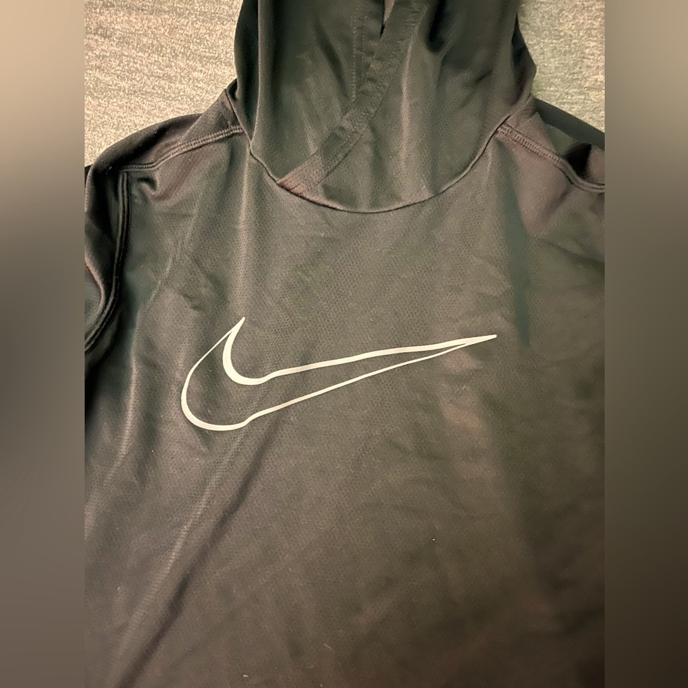 Nike long sleeve sweat shirt /W hood Drifit. Never been worn